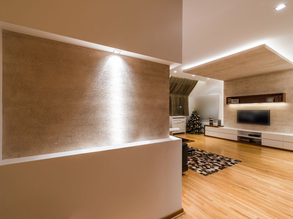 Essa abordagem combina perfeitamente com outras tendências de decoração para apartamento, como o uso de materiais naturais e paletas neutras, criando um contraste elegante entre o moderno e o sentimental.